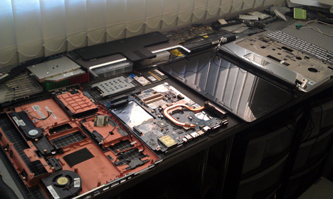this shows a laptop that has been taken apart we take apart and fix broken laptops in stevenage near hitchin letchworth welwyn hertford knebworth phone 01438300132 to get you computer fixed today by a laptop repair expert