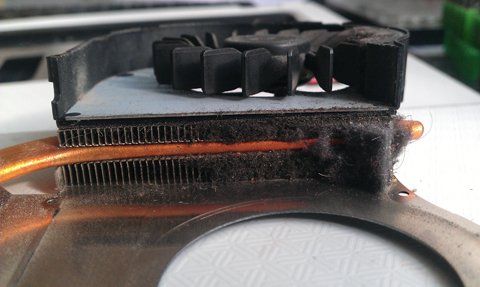 blocked laptop fan grill taken apart to be cleaned by a professional laptop cleaning compnay in stevenage hertfordshire near hitchin letchworth welwyn hertford knebworth